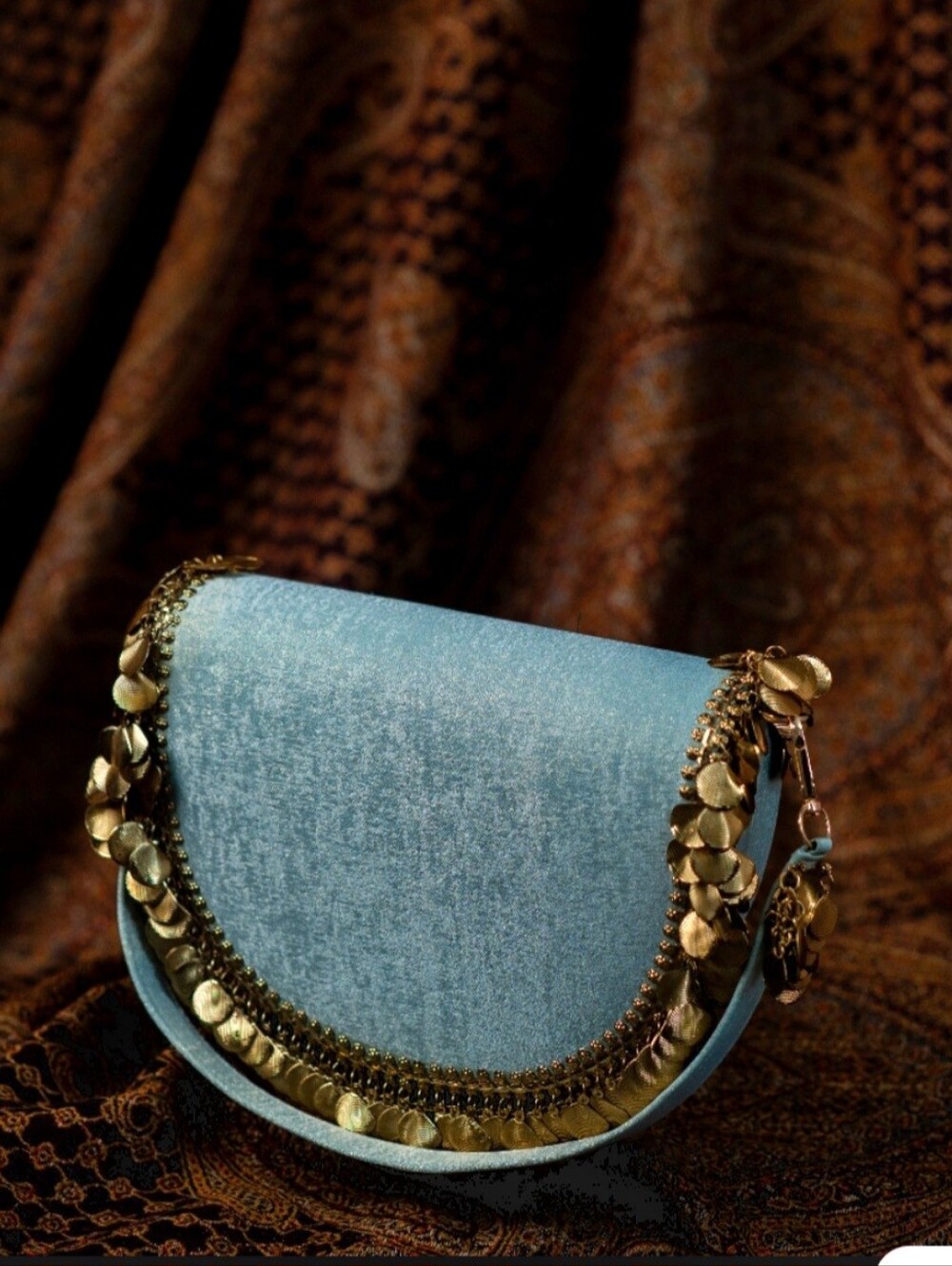 Elegant Light Blue Crossbody Bag with Gold Accents